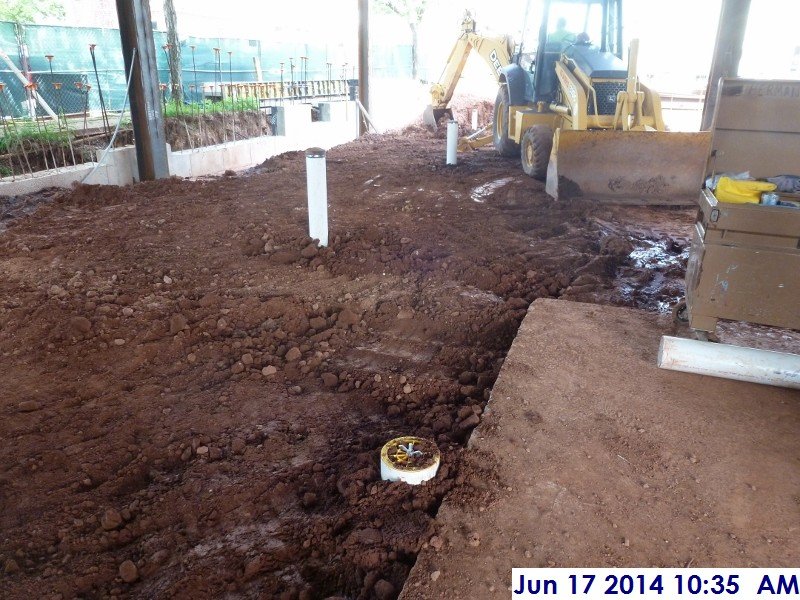 Backfilling and compacting the underground piping Facing North (800x600)